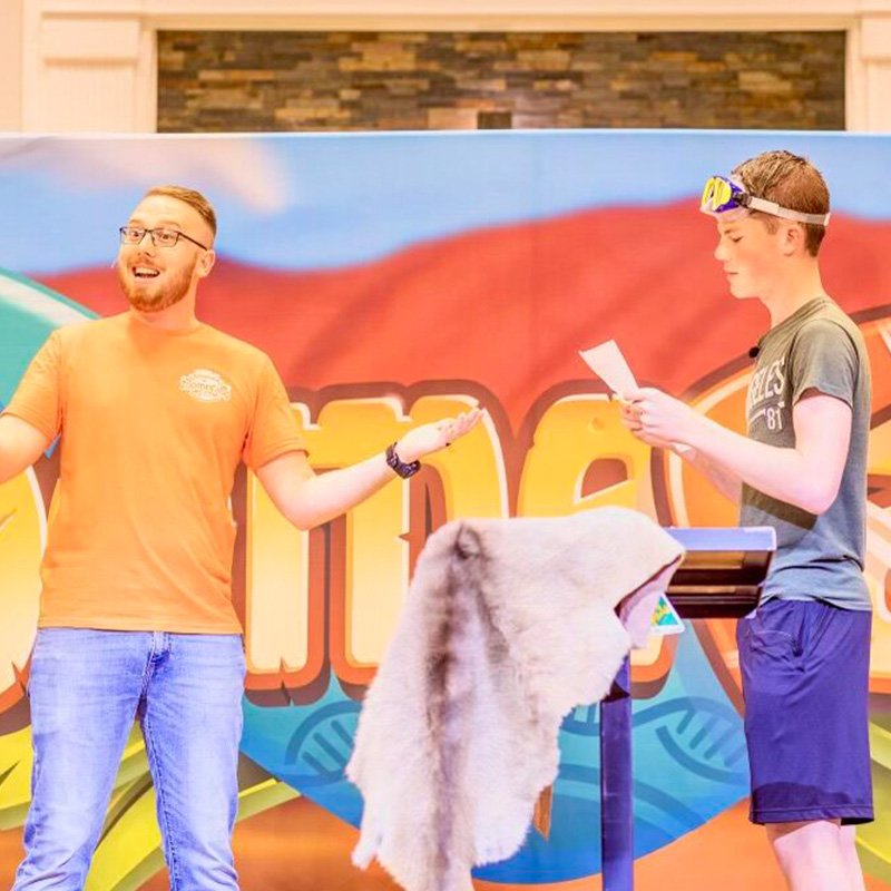 An image of workers having a show at Lighthouse Baptist Church's VBS in Theodore, AL.